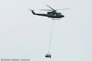 Car will be dropped from this helicopter seconds later...